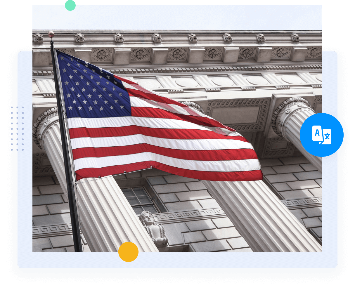 American Flag In front of a United States Government building with columns.