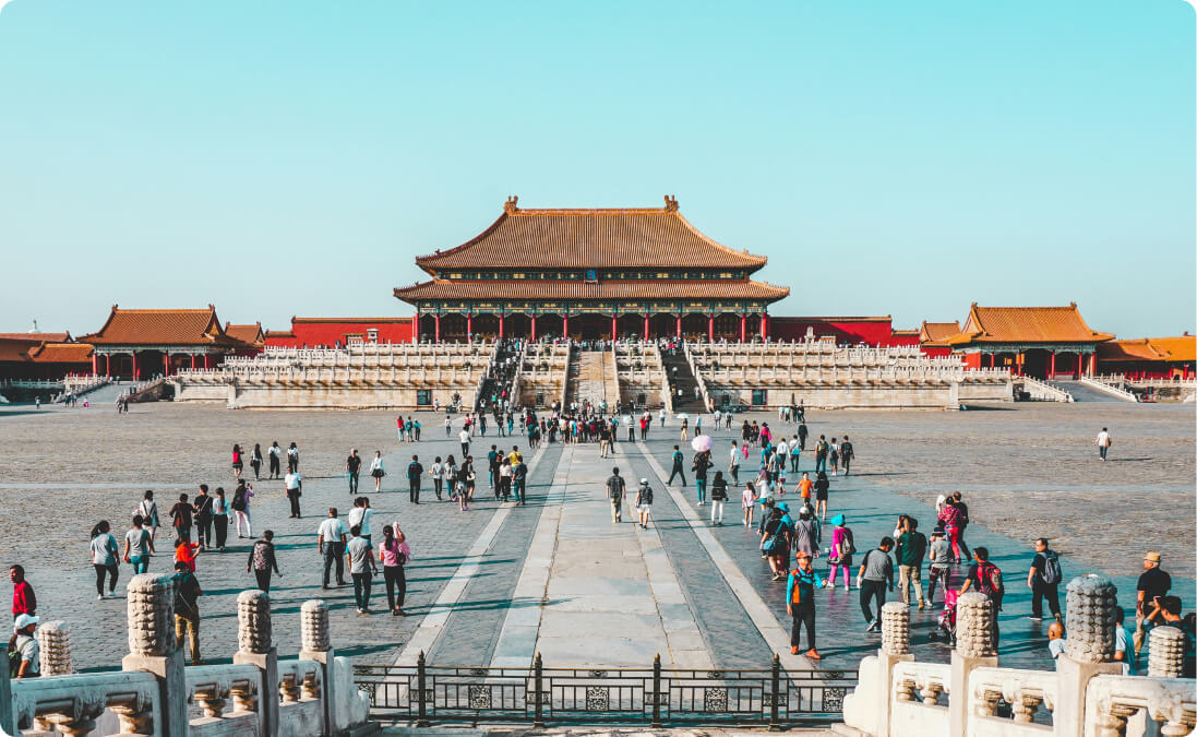 Visitors at the Forbidden City in China representing a traditional Chinese translation and other language quality translations.